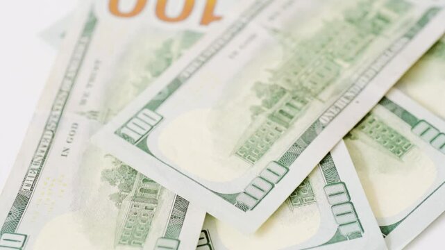 Luxurious dollar bills with movement. Closeup of crisp bills in gentle breeze. Detailed image showing highquality dollar bills with soft wind and vibrant green hues