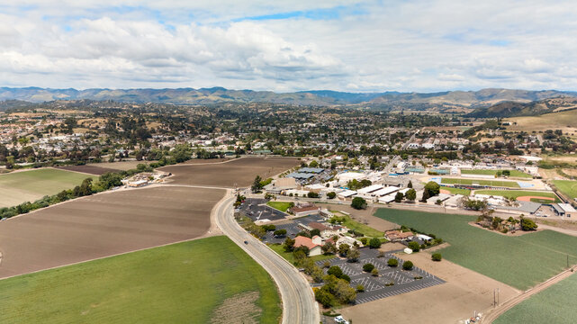 Drone view of farmland and suburban hills in Arroyo Grande California