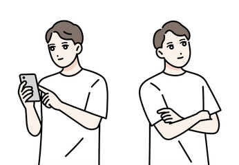 Fototapeta premium 笑顔の若い男性の立ち姿 スマホを操作している