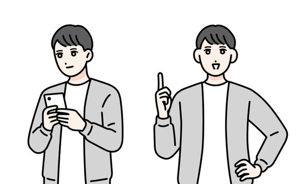 笑顔の若い男性の立ち姿　スマホを操作している