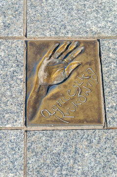 Miedzyzdroje, Poland - May 3, 2026: Handprint and signature of Agnieszka Krukiwna at Walk of Fame, Promenade of Stars (Promenada Gwiazd). Agnieszka Krukiwna is a Polish film actor.