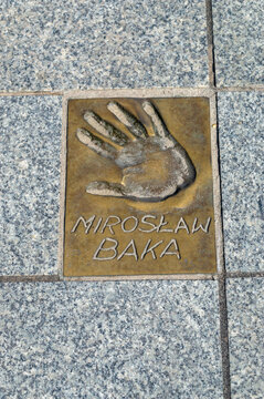 Miedzyzdroje, Poland - May 3, 2026: Handprint and signature of Miroslaw Michal Baka at Walk of Fame, Promenade of Stars (Promenada Gwiazd). Miroslaw Baka is a Polish actor.