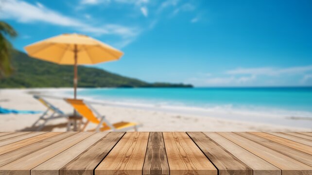 Wooden table product display photo background with blurred tropical beach and umbrella