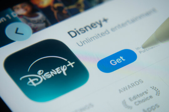 Dhaka, Bangladesh- 06 Dec 2025: Close-up of the Disney+ app on a screen with a stylus pointing at it.