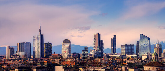 Fototapeta premium Milan skyline and CityLife area with the three tower skyscrapers at nice sunset