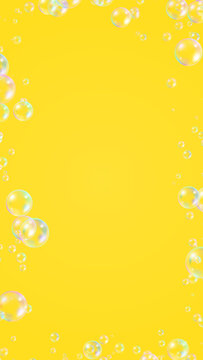Floating Soap Bubble Border Frame on yellow background ,air bubbles cosmetics and cleaning vertical social media design element