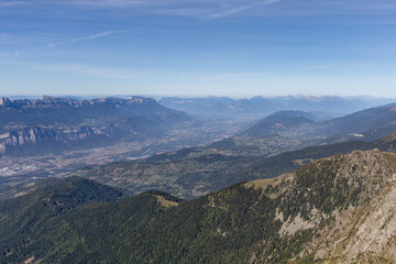 Obraz premium Scenic panorama from Le Grand Colon with alpine peaks and mountain scenery in the Belledonne Massif, French Alps