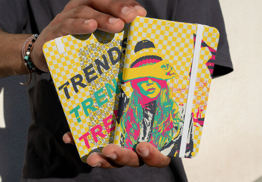 Mockup of a front and back  Notebook covers  in Hand
