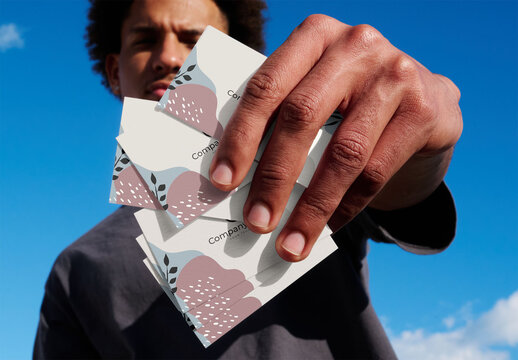 Business Card Hand Mockup in Outdoor Setting