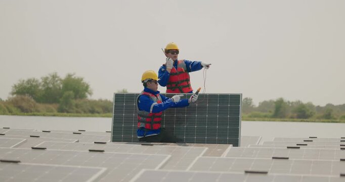 Technicians check floating solar farm wiring, polarity, and grounding for reliability and safety