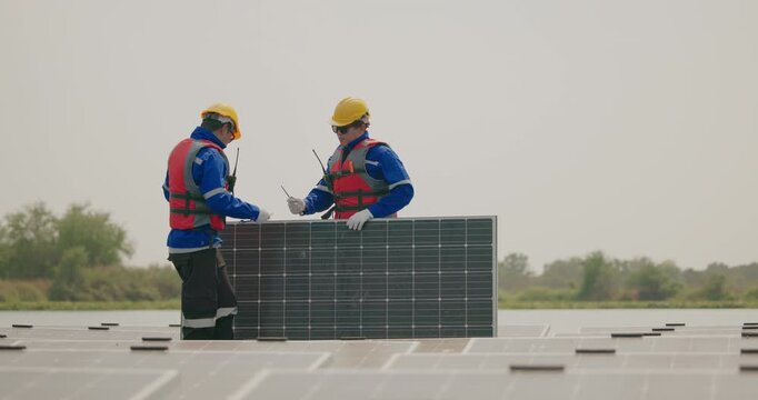 Technicians check floating solar farm wiring, polarity, and grounding for reliability and safety