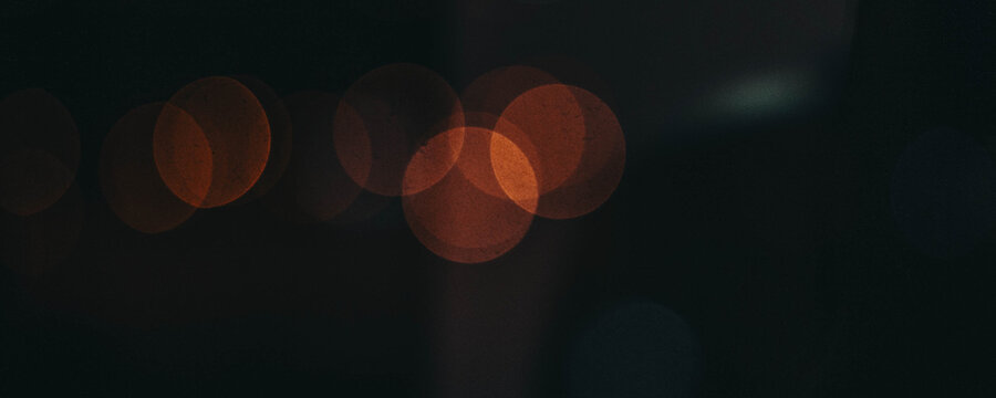 Orange Bokeh Light Effect
Abstract Defocused Lights
Warm Glowing Circle Background