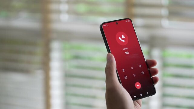 Man calling emergency number 911 for crisis situation