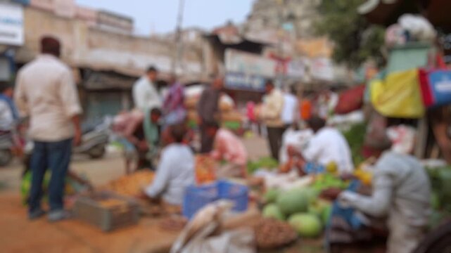 Bokeh view of vegetable market in Varanasi, India. Blurred background footage.