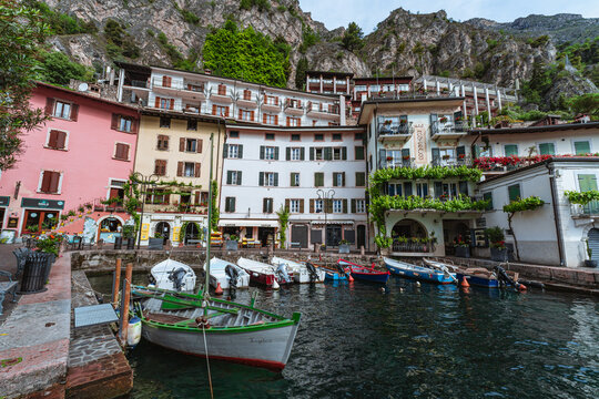 Scenic landscape of Limone sul Garda village, Lake Garda, Italy. Picturesque colorful houses and a peaceful harbor surrounded by blue waters and majestic alpine mountains. - Limone sul Garda, may 2026