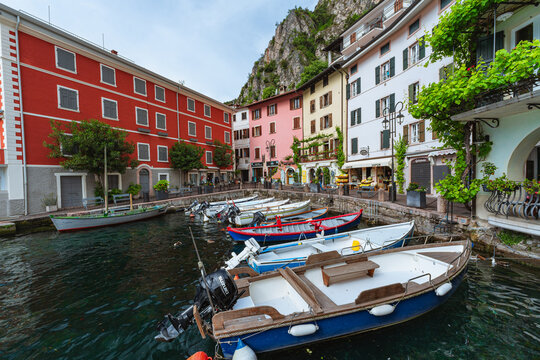 Scenic landscape of Limone sul Garda village, Lake Garda, Italy. Picturesque colorful houses and a peaceful harbor surrounded by blue waters and majestic alpine mountains. - Limone sul Garda, may 2026
