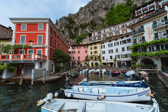 Scenic landscape of Limone sul Garda village, Lake Garda, Italy. Picturesque colorful houses and a peaceful harbor surrounded by blue waters and majestic alpine mountains. - Limone sul Garda, may 2026