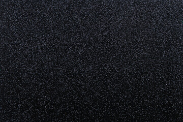 Fototapeta premium Textured black background for adding text or designs in various projects and applications
