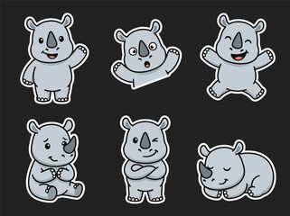 Cute rhino cartoon mascot collection with playful expressions and adorable poses. Kawaii safari animal vector sticker set for kids and nursery use © Amie