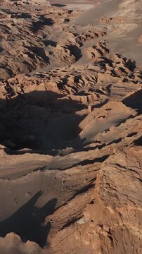 Atacama Desert, Chile. San Pedro de Atacama, Valle de la Luna. Aerial view by drone. Vertical video
