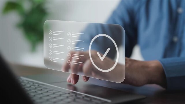 Project administrator completing task checklist on digital laptop interface. Concept of quality control, standard operating procedures, project milestone approval, and workflow verification success.