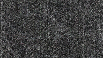 Fototapeta premium Dark gray and black textured background with white scratches and marks