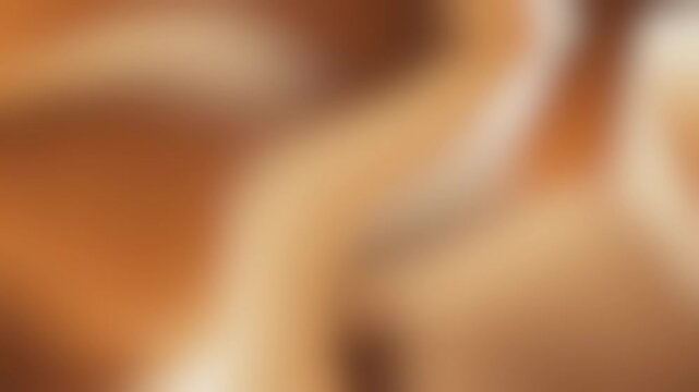 Soft blur brown fluid abstract seamless motion background animation.
