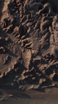 Atacama Desert, Chile. San Pedro de Atacama, Valle de la Luna. Aerial view by drone. Vertical video