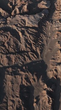 Atacama Desert, Chile. San Pedro de Atacama, Valle de la Luna. Aerial view by drone. Vertical video