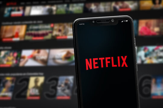 Cali, Colombia - May 25 2026: Smartphone displaying Netflix app with streaming platform background