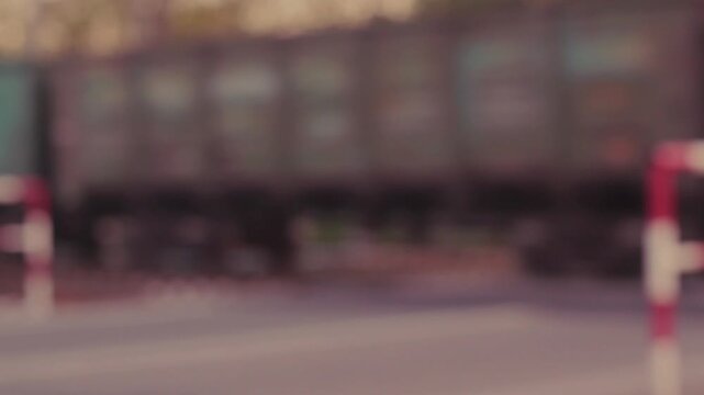 A freight train rushes past on the rails video