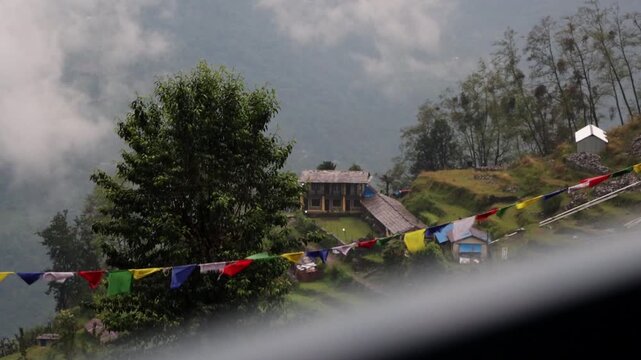 Scenic Himalayan Village Landscape and Colorful Prayer Flags in Ghandruk in Nepal