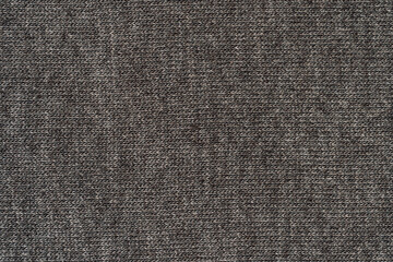 Gray knit fabric texture in close up. © Anastassiya 