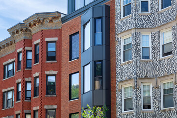 Row of traditional historic brick and modern renovated townhouses in Boston, Massachusetts, USA  © Baharlou