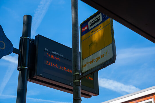 Assen, Netherlands 05.05.2026 Bus stop sign and public transport arrival display in the Netherlands