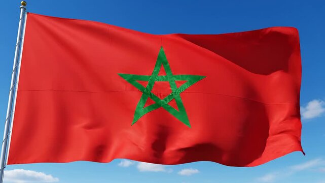 Moroccan Flag Waving Proudly Against a Clear Blue Sky.