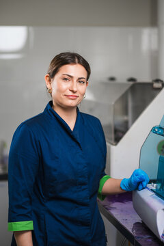 Dedicated Medical Scientist In Navy Attire With Friendly Expression And Prepared For Duties