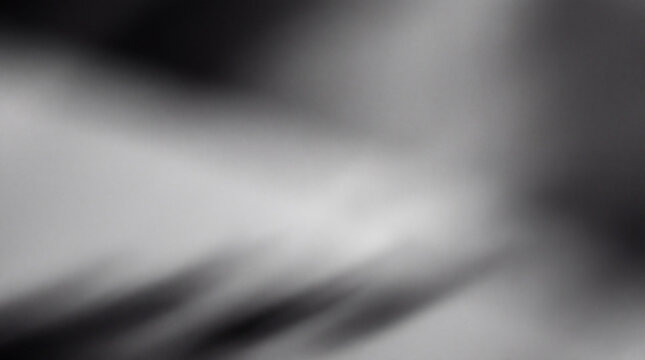 Abstract monochrome background featuring blurry motion design with smooth grey gradient and subtle blurred texture perfect for modern backdrop