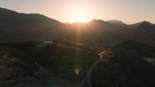 Sunrise drone video in the Cretan Mountains, in the Mediterranean sea
