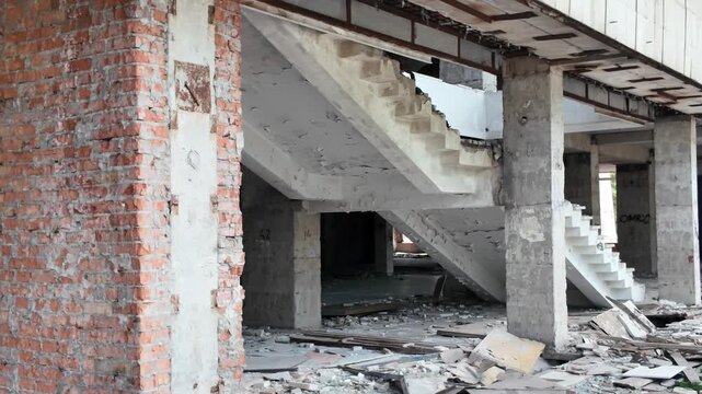 Inside an Abandoned Industrial Building with Concrete Staircase