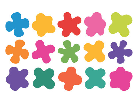 A colorful arrangement of flower-shaped objects in various hues on a white background