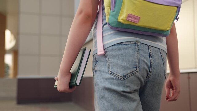 child goes school, child kid carries book hand, child kid carries school textbook hand, elementary school student, educational program, child goes to class holding book hand, class lessons lessons