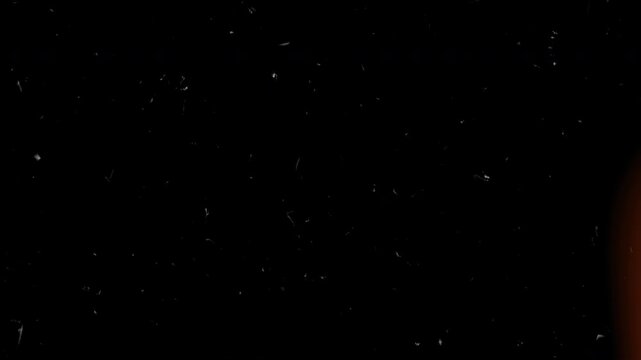 4k stock | Vintage overlay video analog editing scratches dust light leaks effect. ideal for cinematic retro film projects and nostalgic video transitions.