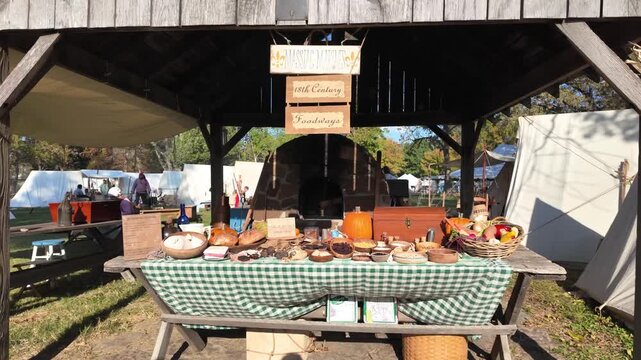 Metropolis, United States - 14 January 2026: View of the 18th Century Foodways display with rustic food bowls and pumpkins at Fort Massac State Park.