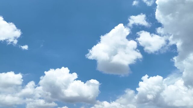 A breathtaking view where clouds dance gracefully across the sky above the rising hills of Assam, India &mdash; a serene moment capturing nature's harmony, beauty, and ever-changing sky canvas. 4k 