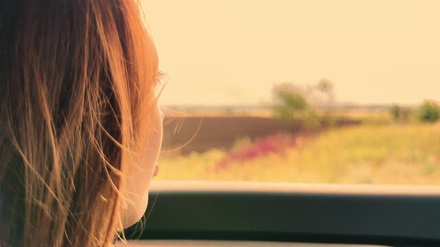 Open window, open heart, Happy traveler finds her peace, Girl s cheerful journey begins, Savoring freedom out the car window, Contentment on a scenic drive, Grinning at life s new roads, Girl relishes