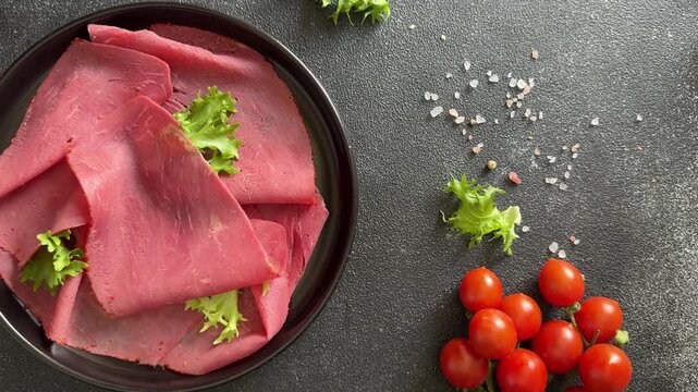 Beef ham thin slices of veal ham meat dish lunch or dinner tasty snack fresh gourmet food background on the table rustic food close-up copy space