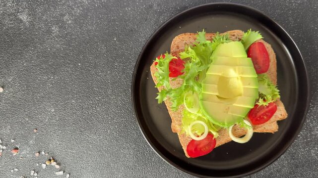 Avocado sandwich snack lunch or breakfast avocado toast open sandwich tasty snack fresh gourmet food background on the table rustic food top view copy space vegetarian and vegan food