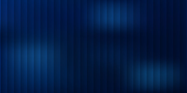 Blue light rays shining on dark background