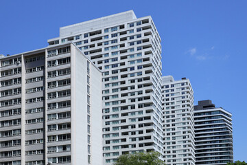 Fototapeta premium Neighborhood of modern high rise apartment buildings with balconies